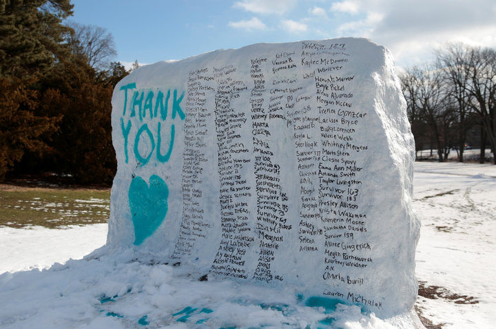 A boulder on the campus of Michigan State University "The Rock" is painted with the names of assault victims of Larry Nassar, a former team USA Gymnastics doctor who pleaded guilty in November 2017 to sexual assault, in East Lansing, Michigan,